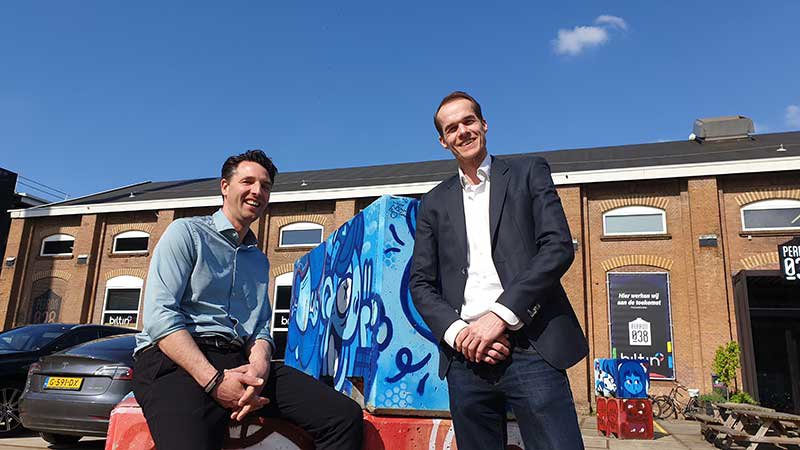 Robert van Kooten en Paul Jutten, beiden lid van de werkveldcommissie, ondersteunend aan de master Data Driven Business